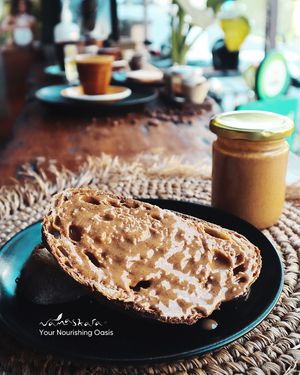 Spread the love with our homemade peanut butter, the star of our banana peanut butter toast! 🥜💛 at Namaskara Coffee & Superfoods in Ubud