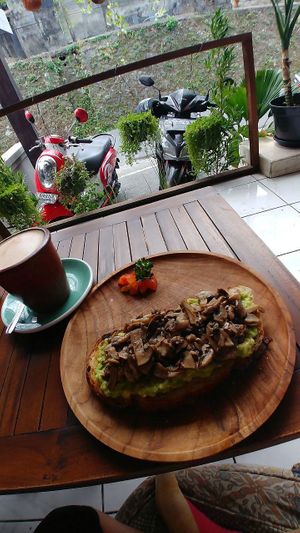 Large size cappucino w/ coconut milk + avo toast at Namaskara Coffee & Superfoods in Ubud