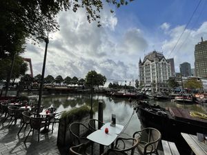 View in the old harbor with other restaurants and cafes around  at Healthful in Rotterdam