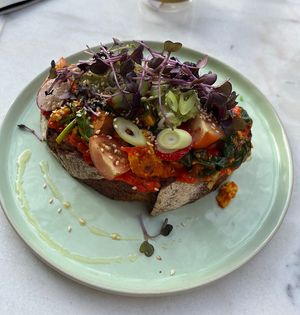Tofu on toast with avocado, radish and ajvar   at Healthful in Rotterdam
