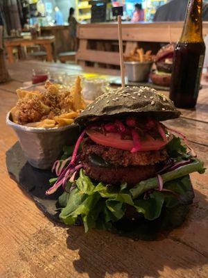 Carboncita burger -one of their four vegan burgers- with garlic fries.  at Bonita Tulum in Tulum