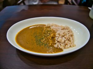 Curry plate with rice at Swell Bowls in Tokyo