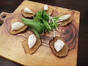 Radish pickles with soy cheese at Swell Bowls in Tokyo