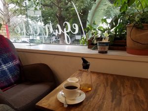 coffee with almond milk  at Swell Bowls in Tokyo