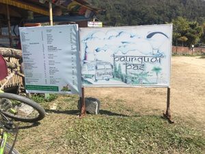 Look out for the sign on lakeside Pourquoi Pas. at Pourquoi Pas in Pokhara