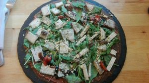 Pizza with four sorts of Cashew cheeses at The Raw Kitchen Malmö in Malmo