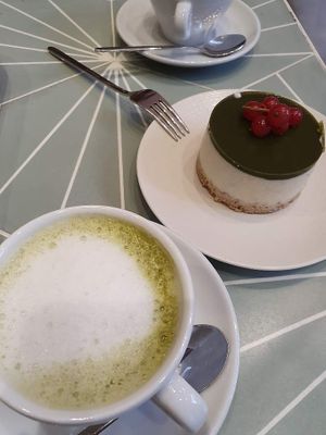 Matcha cappuccino and vegan matcha cheesecake  at Macha Cafe in Milan