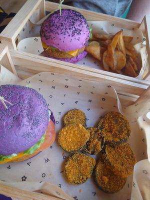 Both sandwiches and their sides at Flower Burger in Bergamo