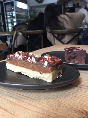 Raw snickers bar & aubergine brownie  at Wolfox in Hove