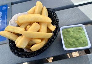 Chips & mushy peas at The Blue Bird Cafe in Worthing