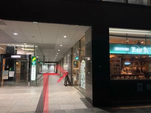 Walk to the end of this corridor and turn right at CoCo Ichibanya - Umeda Sky Building in Osaka