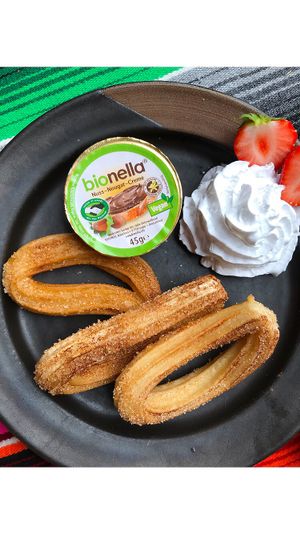 Churros with vegan Nutella and vegan whipped cream.  at El Castillo in Valkenburg