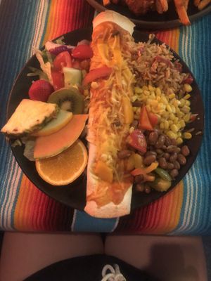 Vegan burrito with vegan minced meat (or vegan chicken), beans, rice, corn and fresh fruit. at El Castillo in Valkenburg