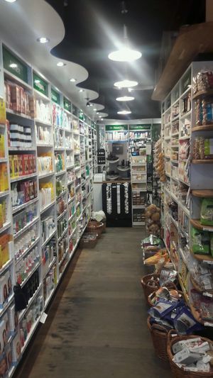 An aisle with beauty products and food at Helsemin - City in Copenhagen