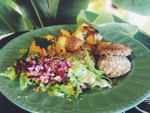 Mushroom and cabbage vegan balls, red lentils pate, baked potatoes and salad  at Kirana Cafe in Peniche