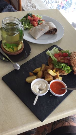 falafel burger and mexican wraps (all vegan) at Kirana Cafe in Peniche