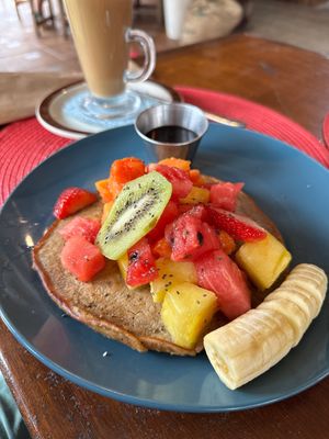 Vegan pancake with chia seeds and fruit  at Aroma Coffee Bar in Cahuita
