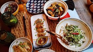 Fried cabbage dumplings, tofu with garlic/ginger/oyster sauce, Noodles with cucumber spring onion/garlic butter peanut sauce, jasmine rice, spring onion pancakes at Suyuan in Bristol