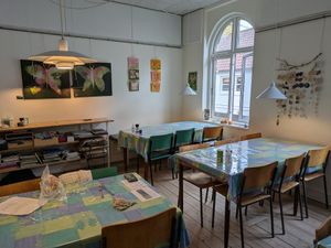 The eating area at Kaernehuset Vegetarian Club in Odense