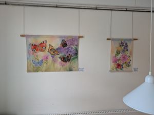 Some of the art being exhibited at Kaernehuset Vegetarian Club in Odense