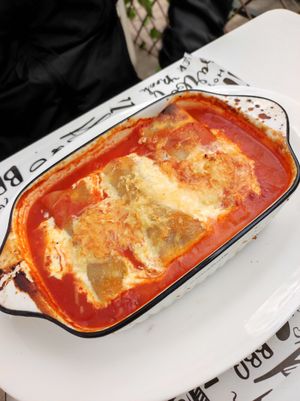 Canelones con salsa pomodoro, rellenos con carne de soya at Lazy Vegan in Santiago