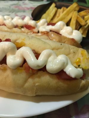 Some weekends they have the promotion 2 hotdogs + French fries $4.000 at Lazy Vegan in Santiago