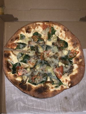 Veggie pizza with vegan cheese and crust 😋 at The Last Chair in Plymouth