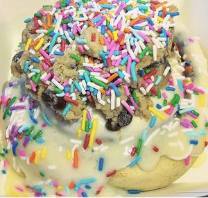 Cream cheese frosting with cookie dough and sprinkles at Cinnaholic in San Jose