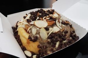 Cinnamon roll with coffee sauce at Cinnaholic in San Jose