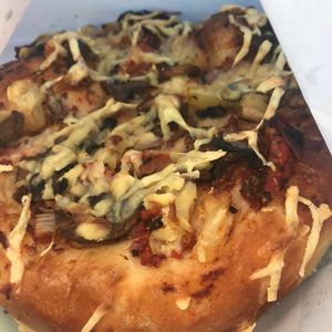 Pizza roll  at Flour of Life Bakery in Helensvale