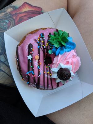 Pink donut at Flour of Life Bakery in Helensvale