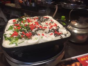 Making Takoyaki  at Self Takoyaki Bar IDUCO in Osaka