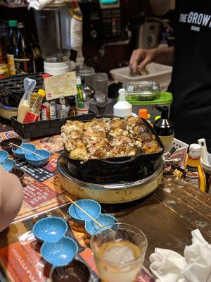 (attempting) to make vegan Takoyaki at Self Takoyaki Bar IDUCO in Osaka
