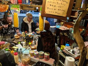 It's a tiny place with space for four takoyaki grills to be going at once at Self Takoyaki Bar IDUCO in Osaka