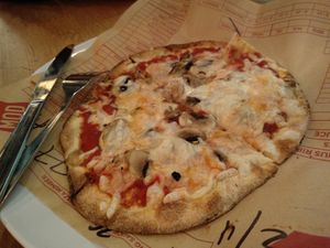 Mini pizza with red sauce, dairy-free cheese and mushrooms. ❤️ at Mod Pizza - Pinnacle Building in Leeds