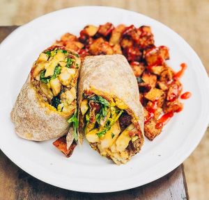 At Common Roots our whole menu can be made plant based upon request. Check out one of our most popular vegan requested items. The Cali Dip Burrito!  at Common Roots Cafe in Rye