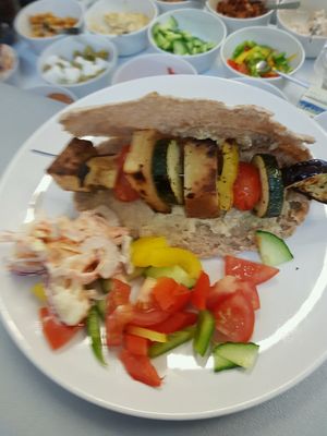 tofu, vegan halloumi and vegetable skewer in a pitta  at Good Intentions in Christchurch