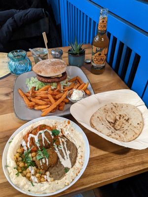 beyond burger, and hummus with pita at Hummus Küch' in Frankfurt