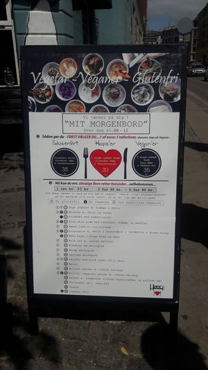 Breakfast menu with vegan options clearly marked at Cafe Hoegs in Copenhagen