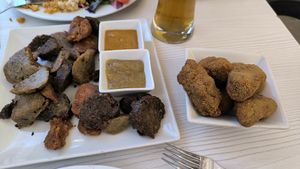 Croquetas de champiñones y mix de butifarra, chorizo y morcilla. at La Casa de la Montaña in Jaca