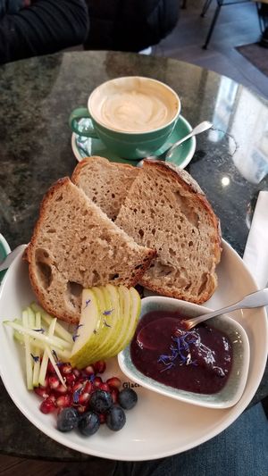 Sourdough bread with jam and fruit at Cuppa Cafe in Paris