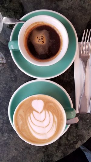 Long American and a cappachino with homemade pressed almond milk at Cuppa Cafe in Paris