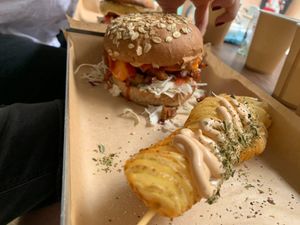 Oyster mushroom gyros burger and potato spiral. at Vegan Beat in Athens