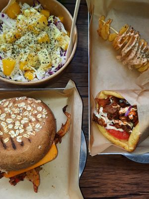 Mango salad, gyro burger and vegan gyro at Vegan Beat in Athens