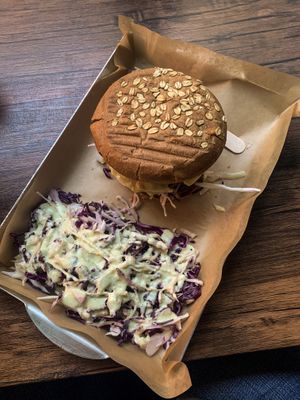 The big boss burger with a side salad 🤤  at Vegan Beat in Athens