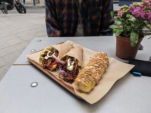 two Mushroom Gyros with Potato Spiral & sauce at Vegan Beat in Athens