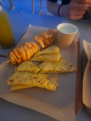 Potato spiral, pita bread and tzatziki at Vegan Beat in Athens