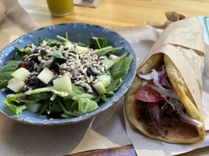 Mushroom-based vegan gyros with spiral potatoes with a side salad  at Vegan Beat in Athens