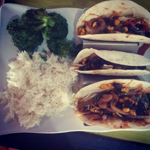 The vegan tacos with rice and broccoli. Tacos are a little spicy but so good!! at Island Wing Company in Destin