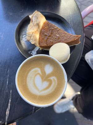 Pumpkin pie, eggnog macaron, oatmilk cappuccinoo  at Dark Hall Coffee in Phoenix